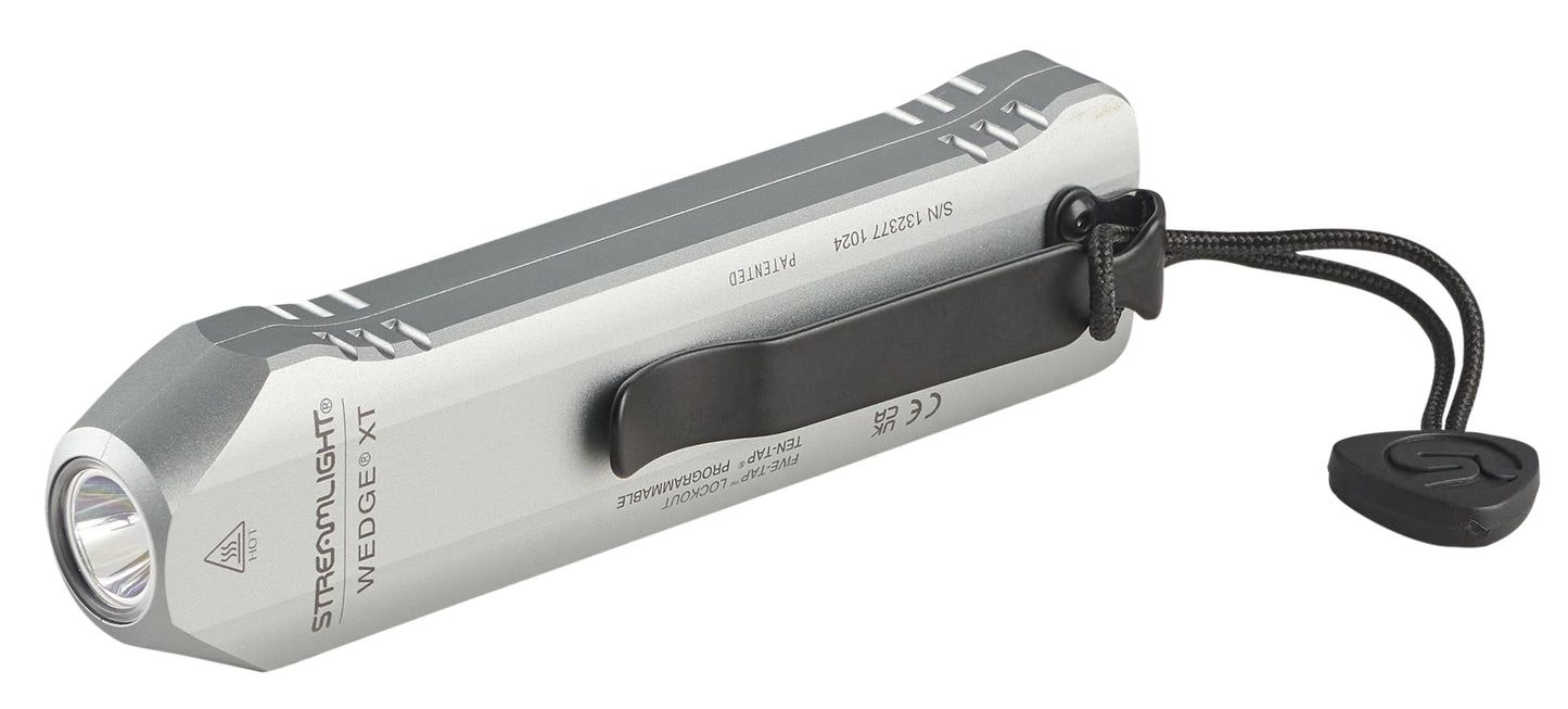 Side view profile of the charcoal silver Streamlight Wedge XT high-performance rechargeable everyday carry (EDC) flashlight, showcasing its low-profile ergonomic aluminum body, heavy-duty black pocket clip, and attached tactical wrist lanyard.