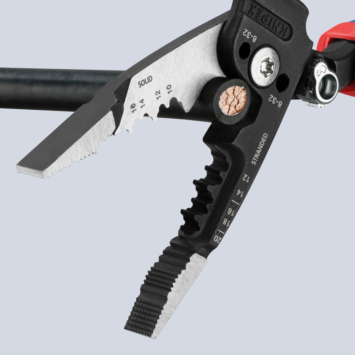 KNIPEX 13 72 8 Forged Wire Stripper cutting thick multi-strand copper electrical wire.