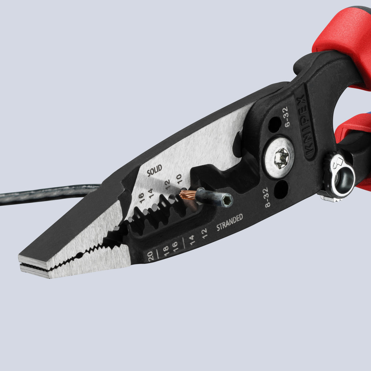 KNIPEX 13 72 8 Forged Wire Stripper stripping insulation off a solid copper conductor wire.