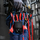 Worker equipped with safety harness carrying KNIPEX pliers secured with fall-protection tool lanyards.