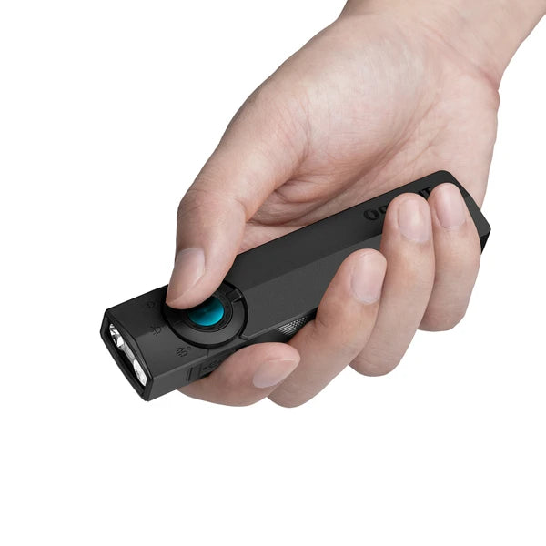 Olight ArkPro EDC flashlight held in hand demonstrating flat unibody grip and easy thumb access to the selector dial