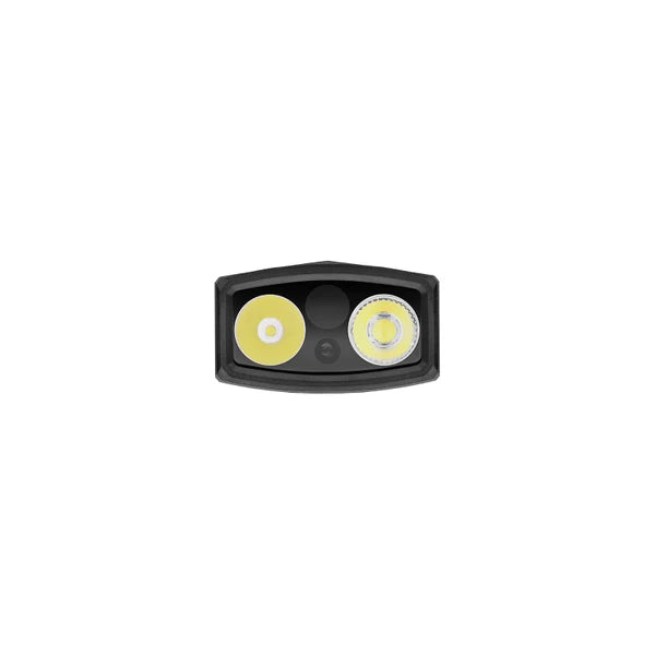 Front bezel closeup of the Olight ArkPro flashlight showing flood optic spotlight TIR lens and green laser emitter