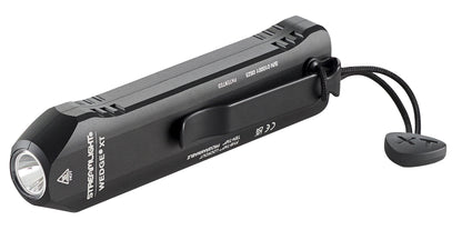 Side view profile of the black Streamlight Wedge XT high-performance rechargeable everyday carry (EDC) flashlight, showing its low-profile ergonomic aluminum body, heavy-duty black pocket clip, and attached tactical wrist lanyard.