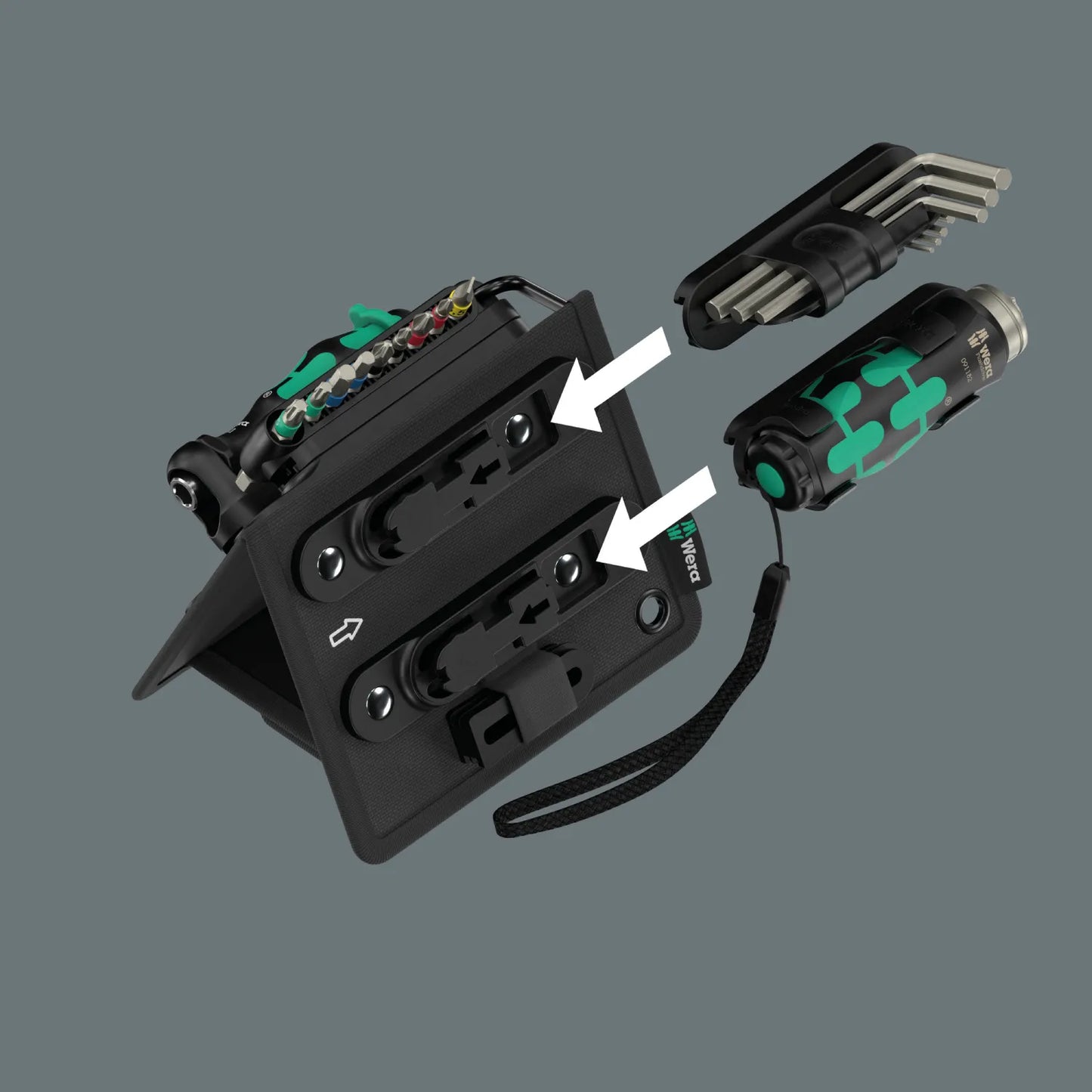 Detailed view of the black folding textile tool case from the Wera 2026 Advent set, with white arrows pointing to the secure clip-in slots for the L-key set and Flashdriver torch.