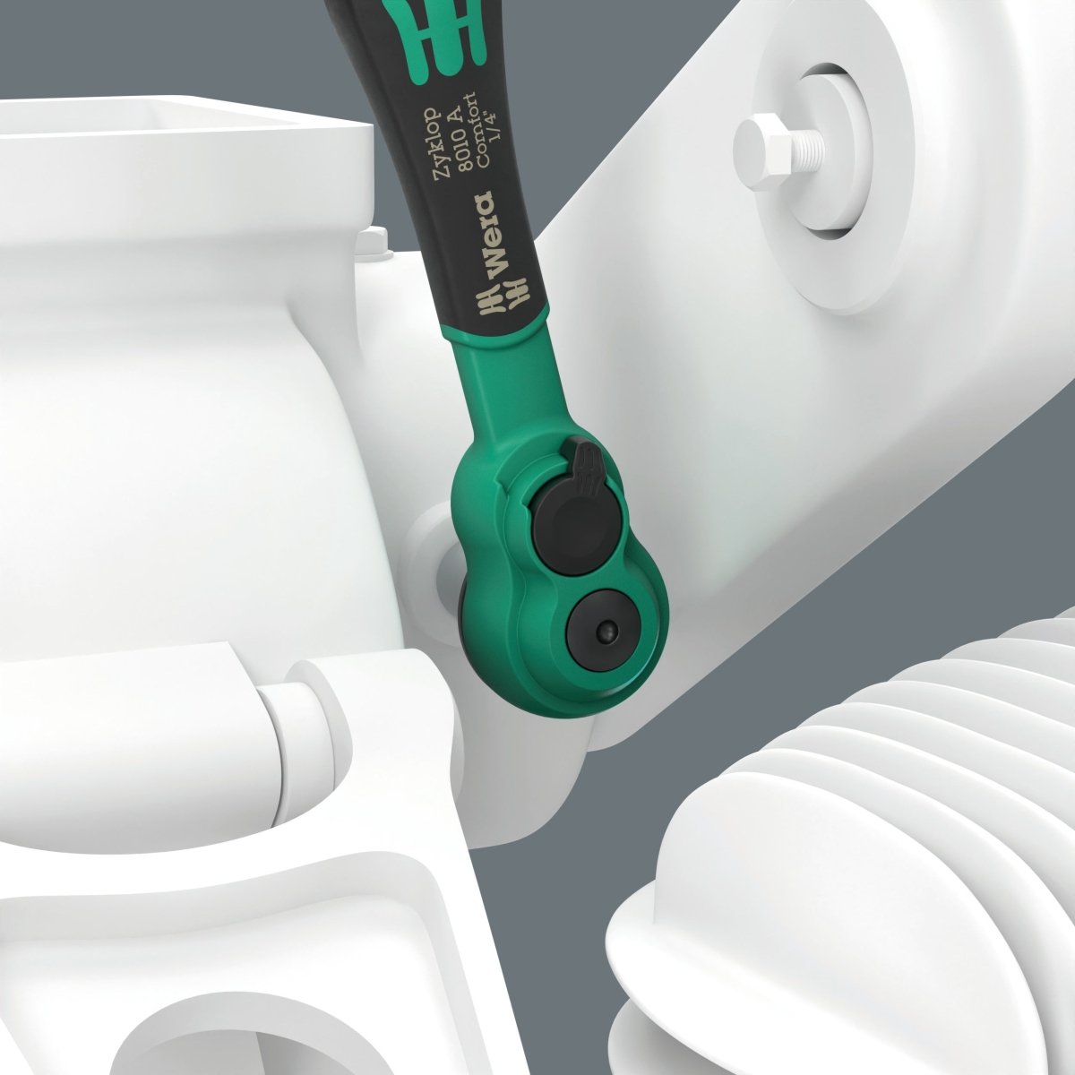 The Wera Zyklop Comfort ratchet in use on an industrial component, demonstrating the reach of the 1/4" drive extension and socket.