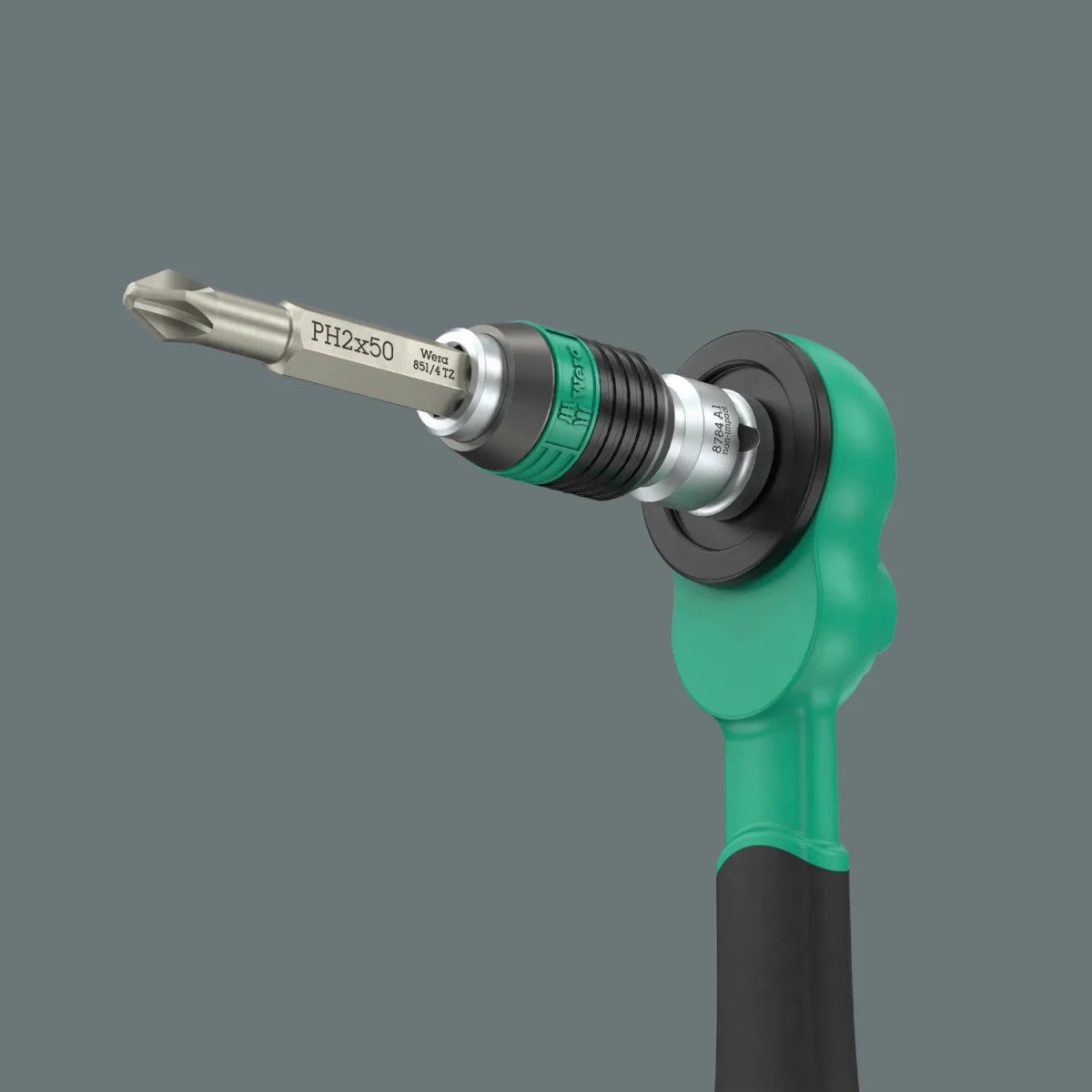 Close-up of the Wera Zyklop Comfort ratchet configured as a high-torque bit driver, using the 1/4" square-to-hex adapter and a screwdriver bit.