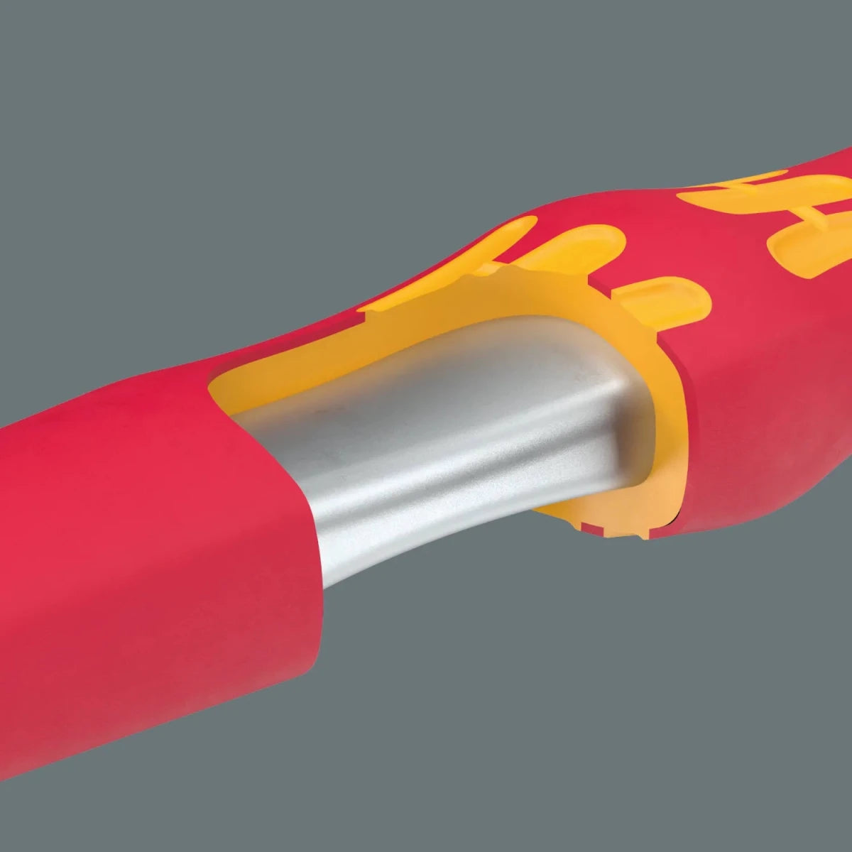 Detailed cross-section of Wera VDE insulation showing the multi-layer protective coating over the high-grade steel ratchet handle.