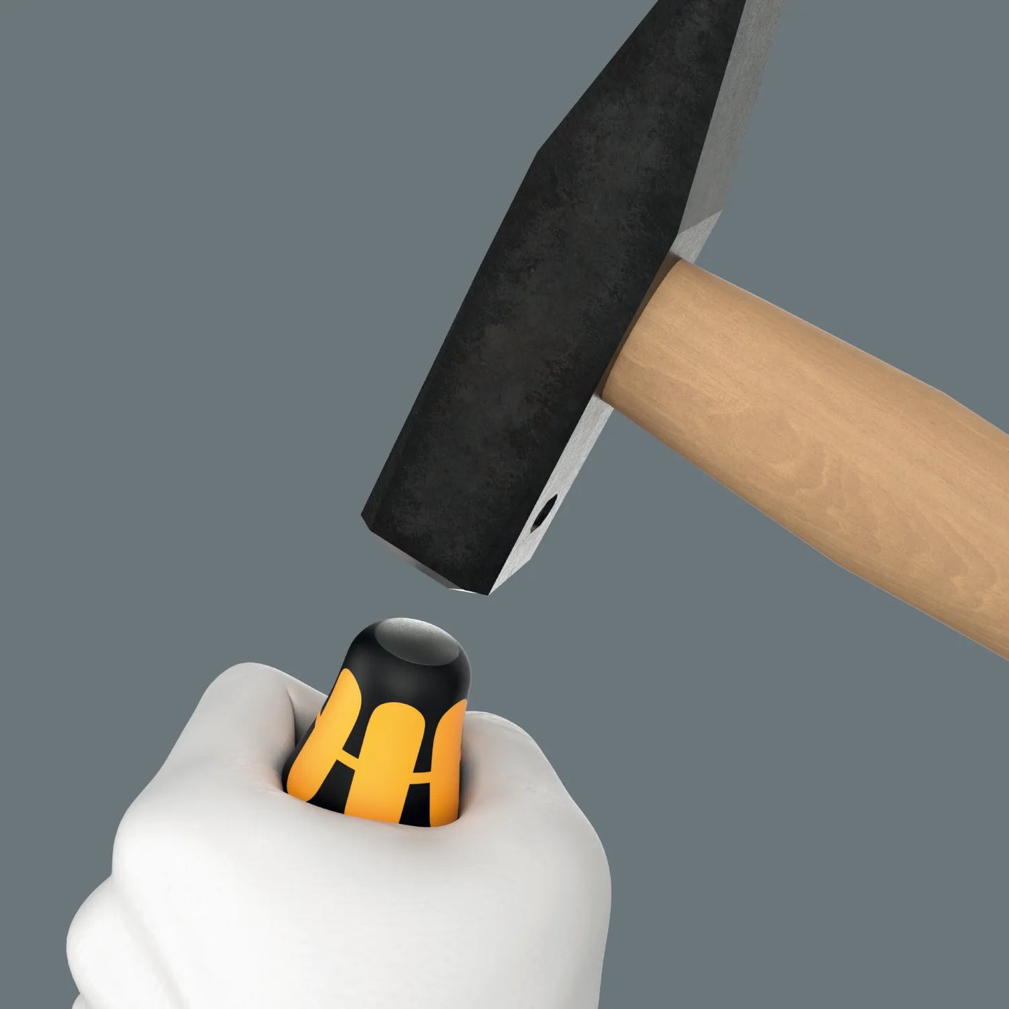 Extreme close-up of a Wera Joker spanner engaging the built-in hex bolster at the base of a Wera 900 series Chiseldriver blade for extra torque.