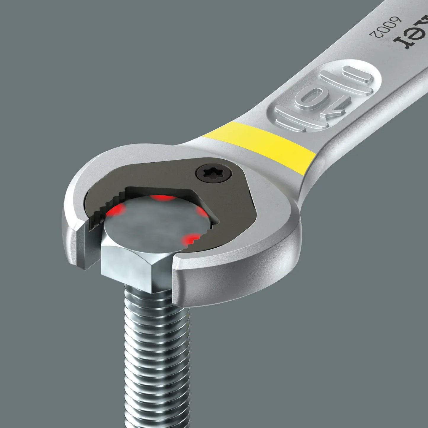 Close-up view of the Wera Joker 6002 spanner metal limit-stop plate resting against a bolt head to prevent slipping down during turn.