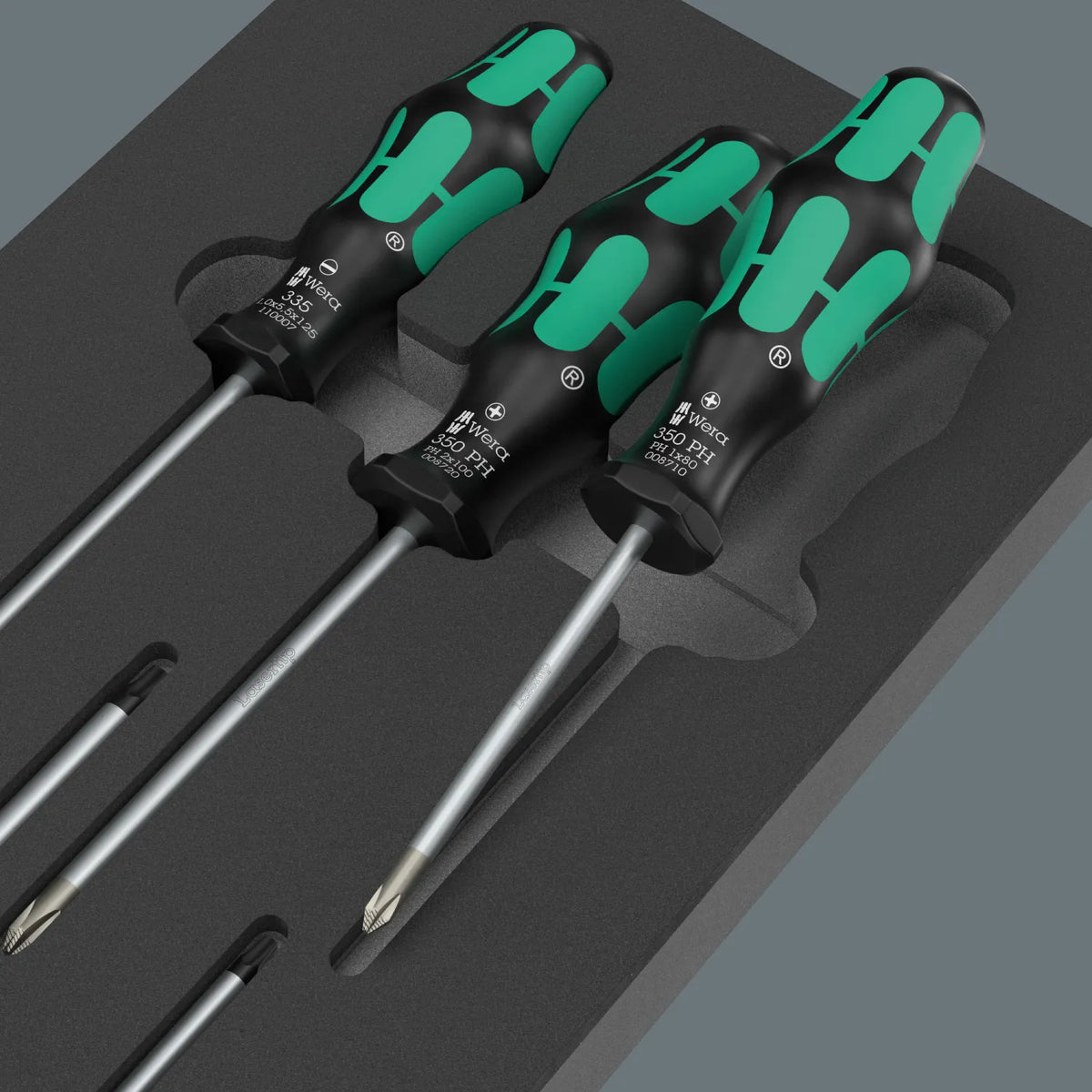 Close-up view of Wera Kraftform Series 300 Phillips and slotted screwdrivers resting in a shadow foam insert