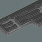 Precision tool cutouts inside an empty two-color Wera shadow foam insert for VDE insulated screwdrivers